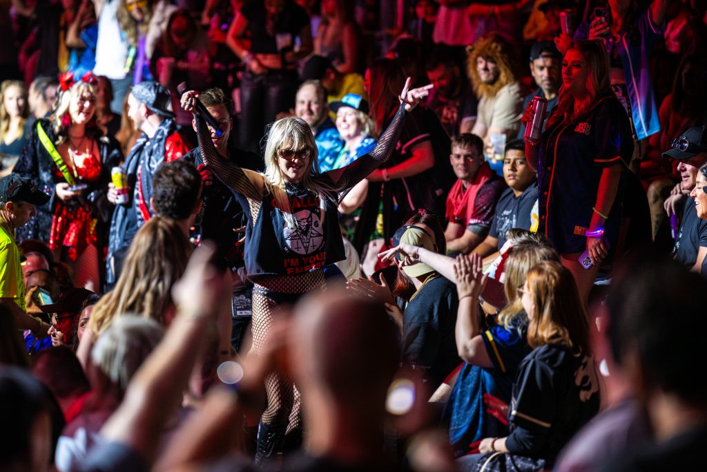 GG Magree in the middle of the Red Rocks crowd posing during her debut live performance.