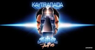 Justice's infamous cross logo creeps from a slit vision of Kaytranada's face. The words KAYTRANADA and JUSTICE FALL '25 border the top and bottom of the image.